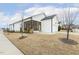 Charming white home features a screened porch and attached garage at 1737 Fence Post Rd, Wendell, NC 27591
