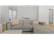 Comfortable living room showcasing the plush sectional sofa with light pink accents at 1737 Fence Post Rd, Wendell, NC 27591