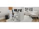 Bright office with a large window, desk space, and comfortable seating for a productive work environment at 1737 Fence Post Rd, Wendell, NC 27591