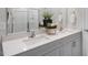 Bathroom featuring double sinks with white countertops and gray cabinetry at 176 Ethel Ln, Angier, NC 27501