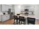 Spacious kitchen features granite counters, stainless appliances, and a large kitchen island at 176 Ethel Ln, Angier, NC 27501