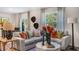 Inviting living room with stylish furniture, decorative pillows, and plenty of natural light at 176 Ethel Ln, Angier, NC 27501
