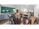 Open-concept space featuring a dining area, stairs, living room, and kitchen area at 176 Ethel Ln, Angier, NC 27501