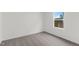 Comfortable bedroom with carpeted floors, neutral paint, and a window with a view at 209 Swift Park Dr, Zebulon, NC 27597