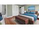Warm bedroom with a spacious bed, large closet, and modern ensuite bathroom for optimal comfort at 2201 Knollwood Dr, Sanford, NC 27330