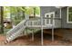 Elevated deck overlooking the backyard with stairs leading down, perfect for outdoor entertaining and relaxation at 2301 Pastille Ln, Raleigh, NC 27612
