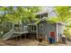 The backyard offers a private deck, an exit door, and access to outdoor enjoyment at 2301 Pastille Ln, Raleigh, NC 27612
