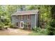 Classic two-story home featuring red shutters, well-maintained landscaping, and a cozy, inviting atmosphere at 2301 Pastille Ln, Raleigh, NC 27612