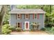 Inviting two-story home showcasing classic architecture, neat landscaping and a welcoming entrance at 2301 Pastille Ln, Raleigh, NC 27612