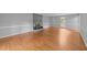 Spacious living room with wood floors and a gray fireplace at 2301 Pastille Ln, Raleigh, NC 27612