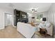 Inviting living room featuring a cozy fireplace, built-in shelving, and abundant natural light at 251 Olde Pl, Zebulon, NC 27597