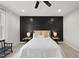 Beautiful main bedroom with decorative accent wall and carpet flooring at 251 Olde Pl, Zebulon, NC 27597