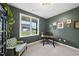 Cozy home office with natural light and ample space for productivity at 251 Olde Pl, Zebulon, NC 27597