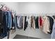 Spacious walk-in closet with ample hanging space for organization and storage at 251 Olde Pl, Zebulon, NC 27597