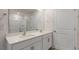 Bathroom features a double sink vanity, large mirror, and framed shower at 281 Hanging Elm Ln, Fuquay Varina, NC 27526