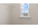 Spacious walk-in closet featuring a window and installed shelving at 281 Hanging Elm Ln, Fuquay Varina, NC 27526