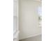 Neutral bedroom includes a large window allowing for ample natural light at 292 Perseus St, Angier, NC 27501
