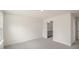 Spacious main bedroom with neutral carpet and an ensuite bathroom at 292 Perseus St, Angier, NC 27501