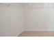 Walk-in closet with shelving for storage and organization at 298 Hanging Elm Ln, Fuquay Varina, NC 27526