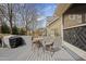 Inviting deck area with outdoor seating and a view of the landscaped backyard at 310 Millsfield Drive Dr, Cary, NC 27519