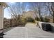 Spacious backyard with a wooden deck, grill, and fenced-in yard at 310 Millsfield Drive Dr, Cary, NC 27519
