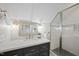 Modern bathroom featuring white countertop, updated fixtures, vanity and glass shower at 310 Millsfield Drive Dr, Cary, NC 27519