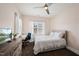 Bedroom with a work space, fan, neutral decor, and great natural light at 310 Millsfield Drive Dr, Cary, NC 27519