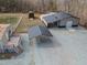 Aerial view of new shop building with carport, storage shed, and back deck of charming home at 341 Acorn Ct, Rougemont, NC 27572