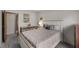Relaxing bedroom featuring a bed, drawers, and a soft neutral color palette at 341 Acorn Ct, Rougemont, NC 27572
