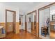Bedroom with a large walk-in closet and tan paint with brown trim at 3510 Middlebrook Dr, Durham, NC 27705