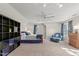 Spacious bedroom with a ceiling fan, large windows and sitting area at 3510 Middlebrook Dr, Durham, NC 27705