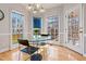 Bright breakfast nook with glass-topped table, flooded with natural light at 3510 Middlebrook Dr, Durham, NC 27705