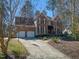 Elegant two-story brick home with a well-maintained lawn and two-car garage at 3510 Middlebrook Dr, Durham, NC 27705