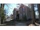 A stately brick two-story residence showcases classic architectural details and well-maintained landscaping at 3510 Middlebrook Dr, Durham, NC 27705