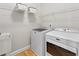 Laundry room with a utility sink and a Maytag washer and dryer at 3510 Middlebrook Dr, Durham, NC 27705