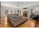 Spacious living room with a large sectional sofa, fireplace, and hardwood floors at 3510 Middlebrook Dr, Durham, NC 27705