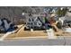 Stunning aerial view of the home and meticulously landscaped front yard in a serene neighborhood at 5025 Fanyon Way, Raleigh, NC 27612