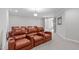 A well-appointed home theater with plush seating for a cinematic experience at 5025 Fanyon Way, Raleigh, NC 27612