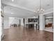 Spacious living room with hardwood floors and an open-concept design perfect for entertaining at 5025 Fanyon Way, Raleigh, NC 27612
