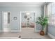 Relaxing sitting room featuring views of an adjacent bedroom and bathroom at 5025 Fanyon Way, Raleigh, NC 27612