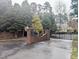 Gated community entrance provides security and privacy for residents at 5300 Grand Gate Dr, Raleigh, NC 27613