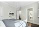 Bedroom with hardwood floors and ensuite bathroom at 543 Guilford Cir, Raleigh, NC 27608