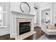 Close-up of a fireplace featuring a tile surround and decorative mantle at 543 Guilford Cir, Raleigh, NC 27608