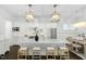 Spacious kitchen with a large island, seating, and modern lighting at 543 Guilford Cir, Raleigh, NC 27608
