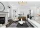 Bright living room with modern decor, fireplace, and open floor plan at 543 Guilford Cir, Raleigh, NC 27608