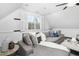 Cozy living room with comfortable seating, bright windows, and a ceiling fan at 543 Guilford Cir, Raleigh, NC 27608