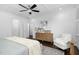 Main bedroom features wood floors, stylish decor, and bright natural light at 543 Guilford Cir, Raleigh, NC 27608