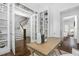 Office featuring built-in bookshelves and a view into the stairwell at 543 Guilford Cir, Raleigh, NC 27608