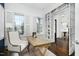 Bright office featuring large windows and view into dining area at 543 Guilford Cir, Raleigh, NC 27608
