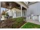 Covered outdoor kitchen area with built-in grill and dining space at 543 Guilford Cir, Raleigh, NC 27608